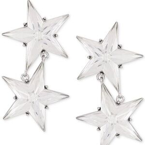 Guess double star clip earrings. Silver hardware and clear plastic stars.